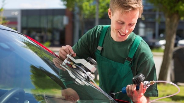 Professional windshield repair in progress
